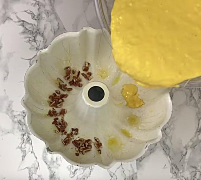 Make a crown royal apple bundt cake with caramel rum glaze