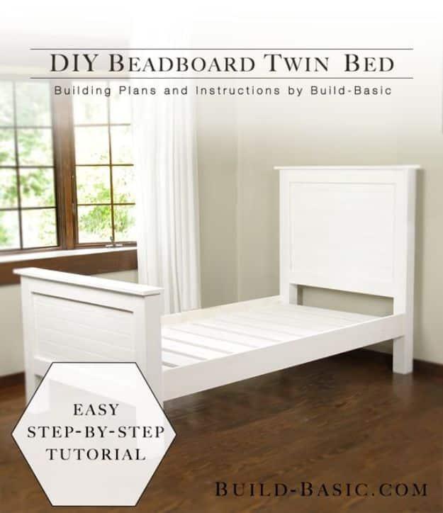 DIY beadboard twin bed graphic showing a white paneled twin bed frame on a dark wood floor by tall windows