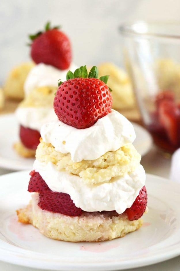 Gluten free strawberry shortcake with a drop biscuit, sweetened sliced strawberries and whipped cream