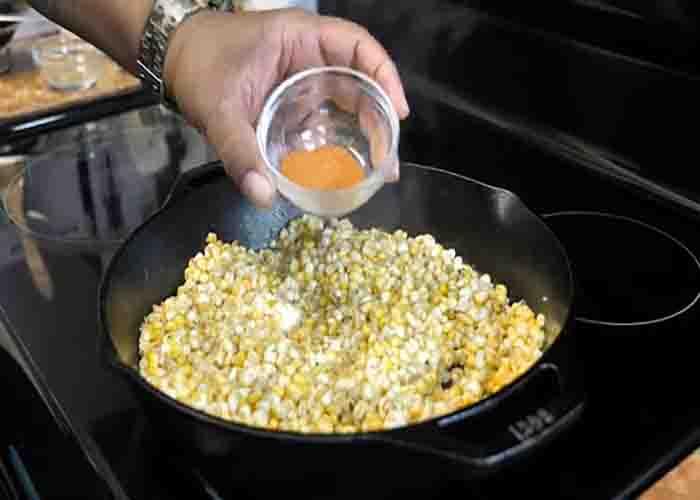 Seasoning the Southern fried corn