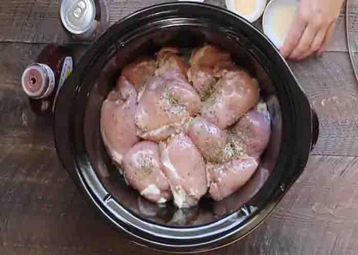 Seasoning the chicken in the slow cooker