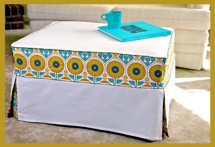 Ottoman slipcover sewing project, a white fitted cover with a yellow and teal patterned band and pleated skirt