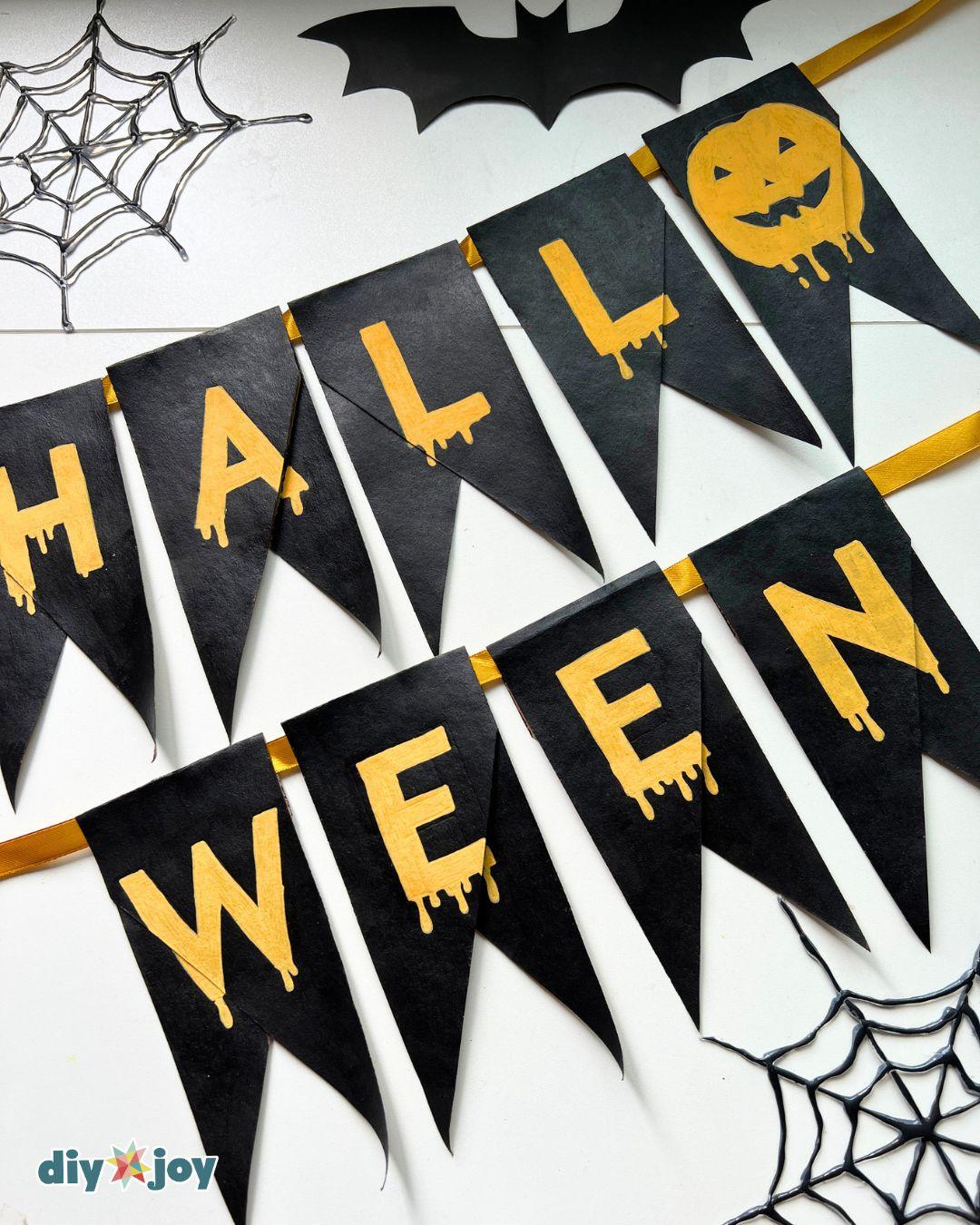 Easy Halloween crafts - the Happy Halloween banner displayed for the season, doubling as cheap Halloween decor.