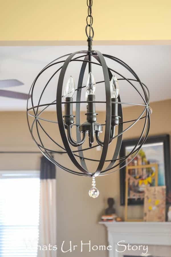 DIY Orb Chandelier, a fun weekend project that transforms a plain fixture and a charming handmade piece for a porch or patio