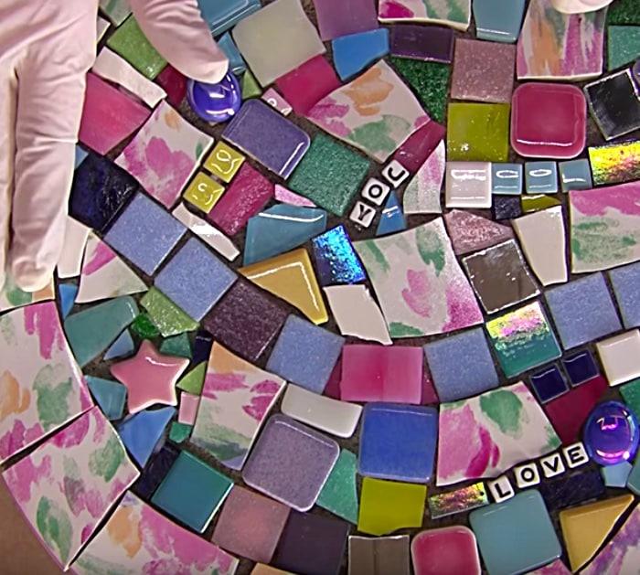 Make a mosaic stepping stone from an old plate