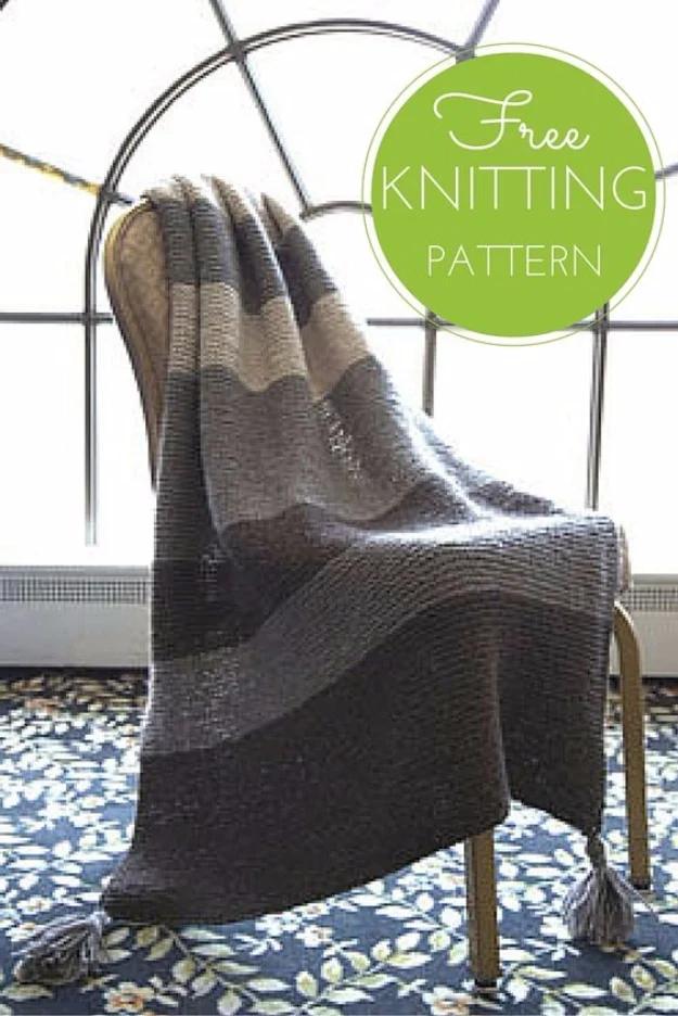 Knitted gift idea: a striped garter stitch throw knit in a rainbow of colors for a cozy handmade blanket