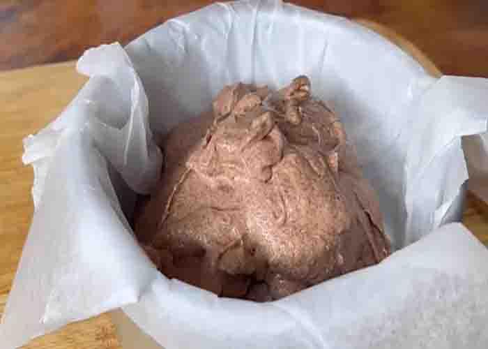 Transferring the mousse cake batter in the cake mold