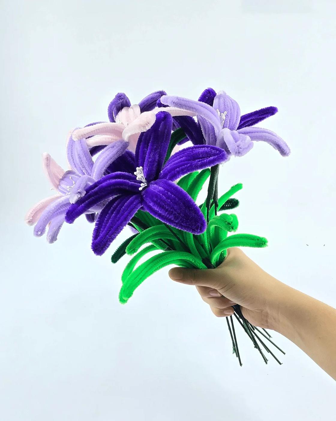 Step by step pipe cleaner flower tutorial showing how to twist chenille stems into petals and a stem