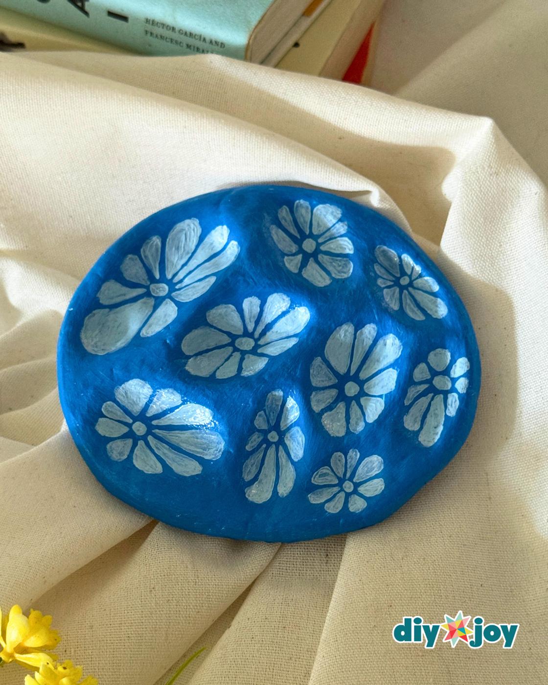 Air Dry Clay Jewelry Organizer Using Pebbles — cute pebble design clay dish