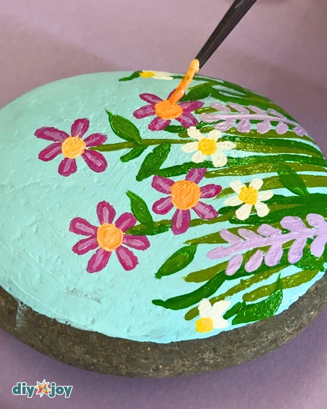 Homemade Flowers On Rocks — easy rock painting for beginners