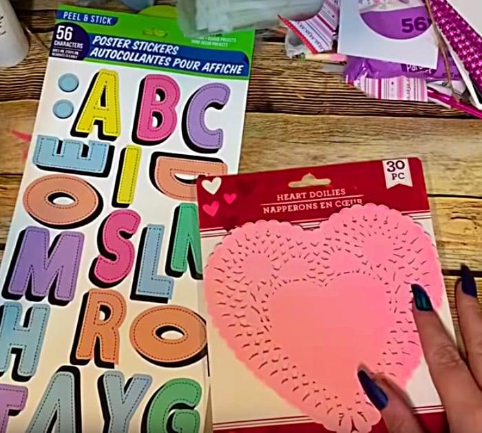 Learn to make a DIY Paper Doily Heart Banner with materials from Dollar Tree