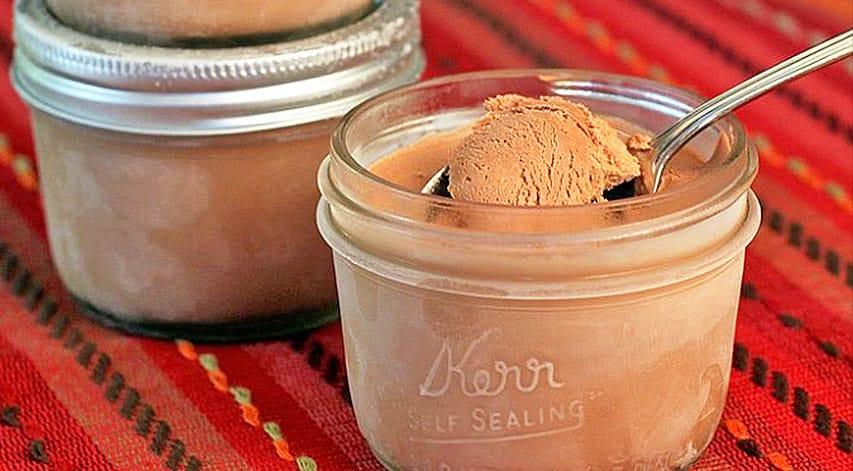 Mason jar ice cream made by shaking cream in a sealed jar, an easy homemade ice cream with no machine
