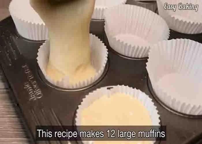 Distributing the vanilla muffin batter to each muffin cup