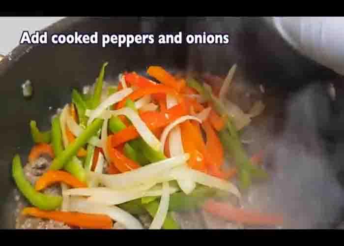Sauteing the veggies for the pepper steak recipe