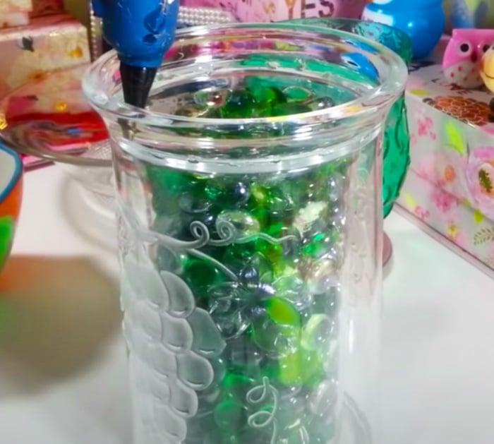 Make a birdbath from a bowl and a candle holder from the thrift store