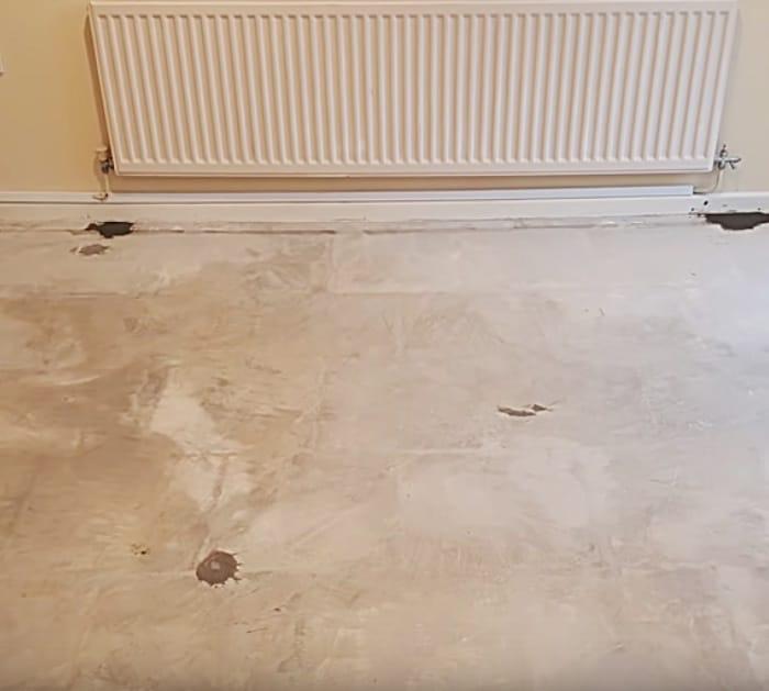 Try a new idea in the kitchen by making an epoxy floor made with pennies
