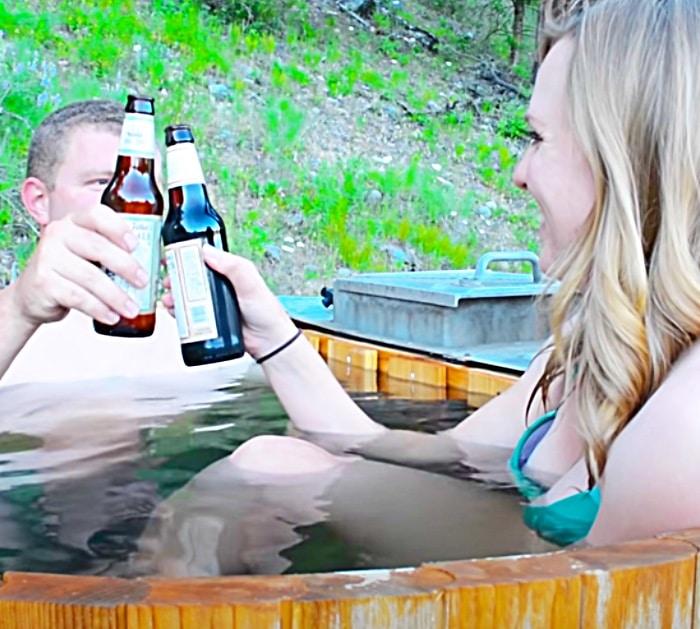 Relax And Soak In A Hot Tub With A Wood Burning Stove