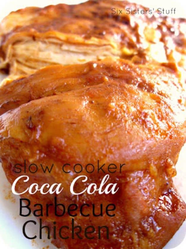 Slow cooker Coca Cola barbecue chicken, saucy glazed chicken breasts plated on white under a recipe title overlay