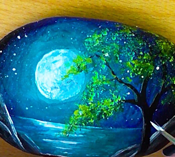 Use Craft Paint To Paint A Night Sky On A Rock