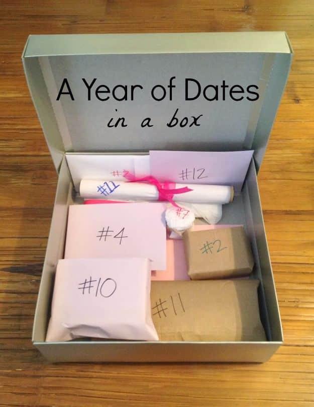 A gift box of twelve numbered date night envelopes with a binder guide, a thoughtful handmade present