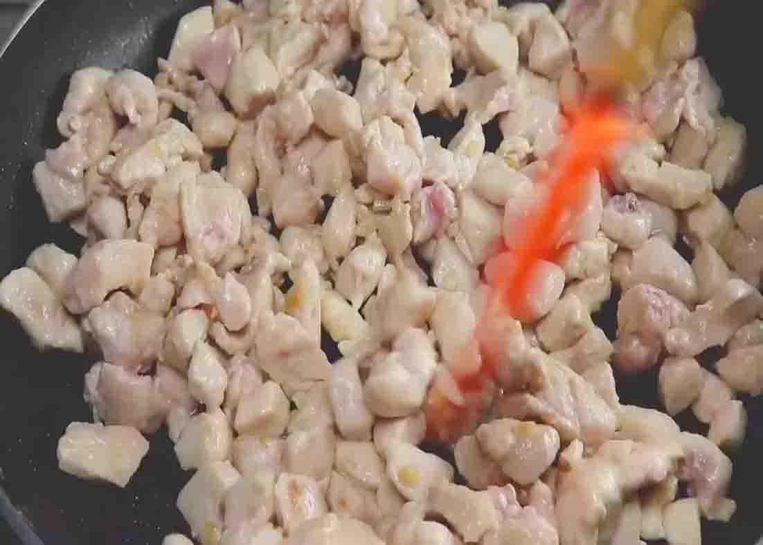 Sauteing the chopped boneless chicken