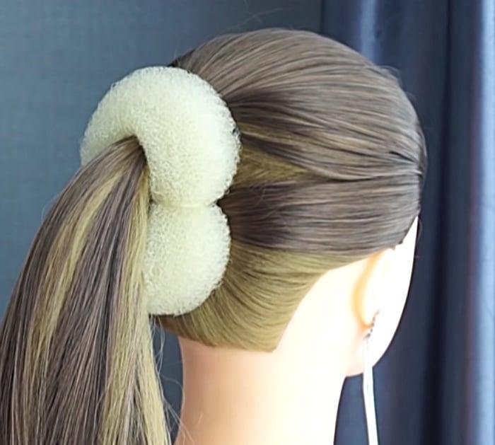 A French twist is a common "updo" hair styling technique. It is created by gathering the hair in one hand and twisting the hair upwards until it turns in on itself against the head