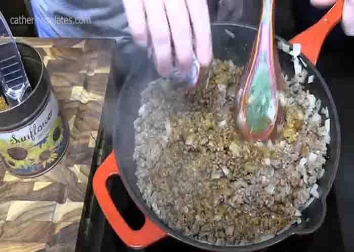 Making the ground beef and cheese sauce for the nacho fries