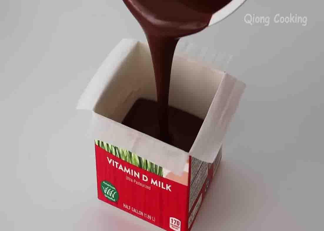Pouring the chocolate lava cake mixture to the container