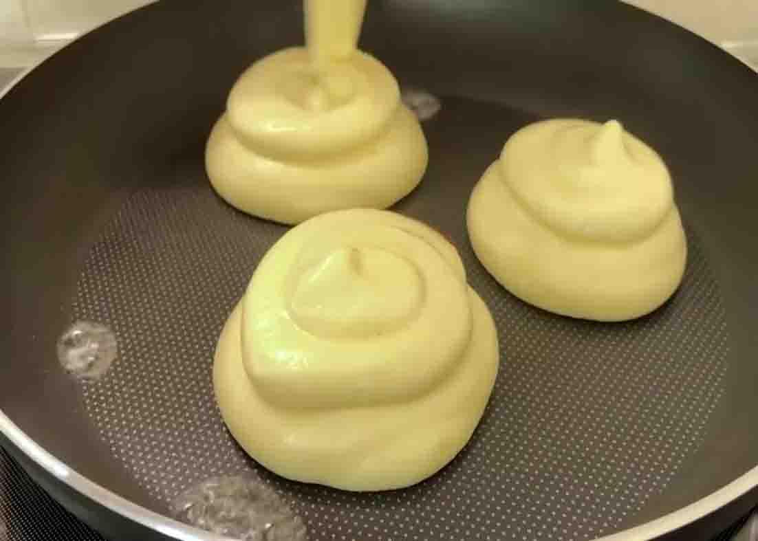 Cooking the pancakes in the pan