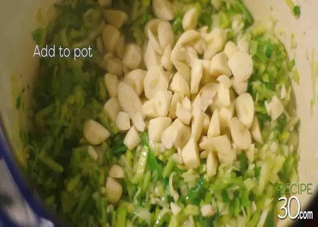 Cooking the garlic, leek, and onions for the Italian-style garlic soup recipe