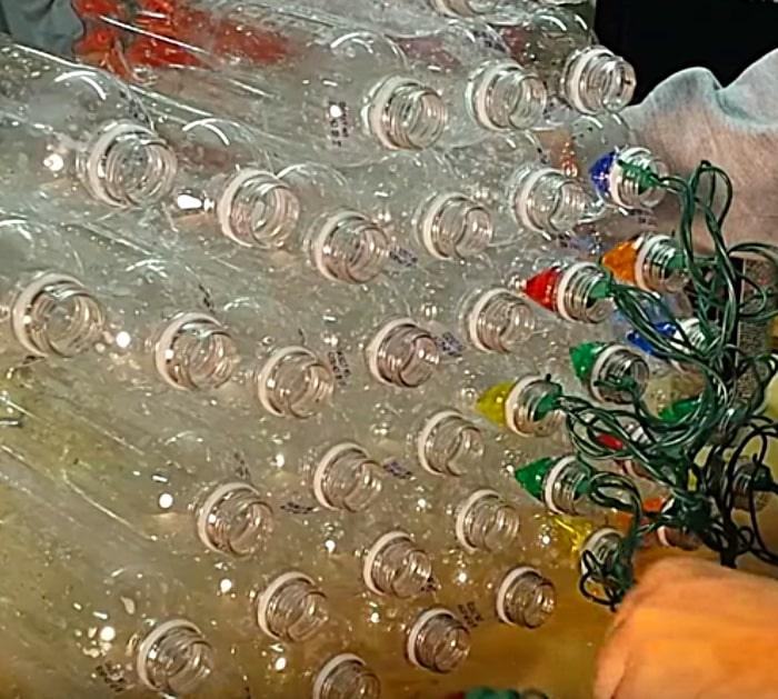 Try using recycled plastic bottles in this DIY cheap fun Christmas Tree Luminary