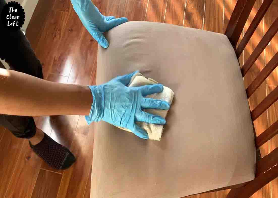 Wipe the upholstery with a towel