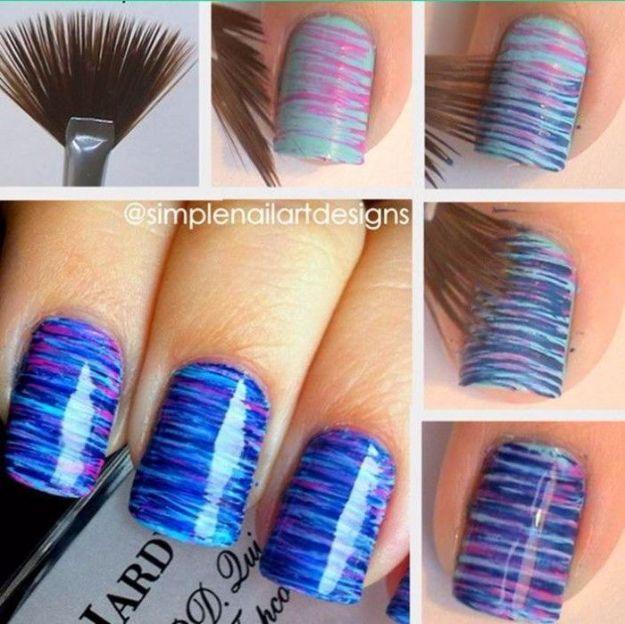 DIY Blue and Pink Fan Brush Striped Nail Art, a creative nail design anyone can copy and an easy DIY manicure technique