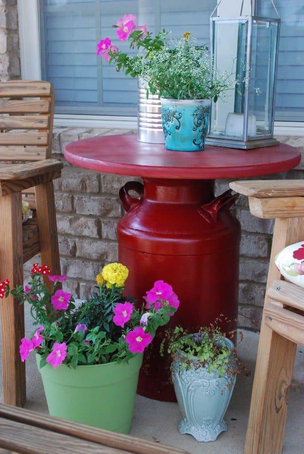 Milk Can Table, a charming accent for a front porch and a creative way to add color to the outdoor space