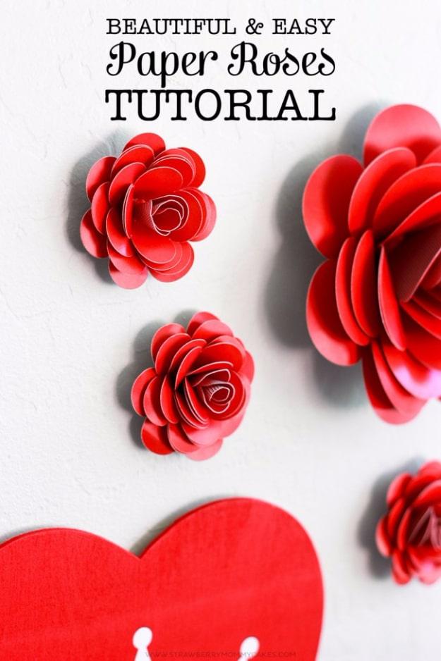 Handmade paper roses in pink and red rolled from spiral cut cardstock arranged as Valentine's decor as a homemade gift