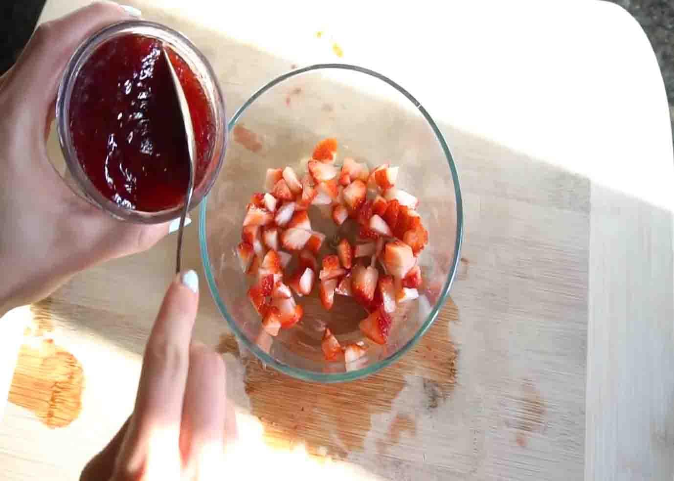 Making the strawberry topping for the mini cheesecakes