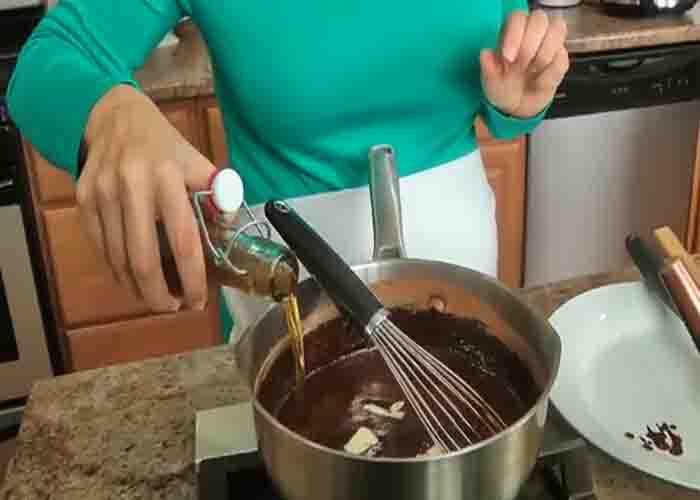 Making the chocolate ganache for the eclair dessert