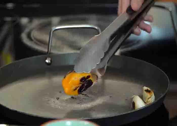Roasting the garlic and habanero for the guacamole recipe