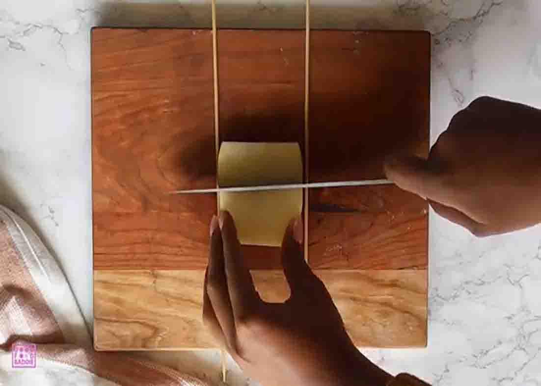 Slicing the potatoes to make the accordion effect