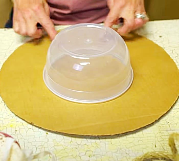 Glue A Plastic Bowl To A Cardboard Circle For A Decorative Hat Idea