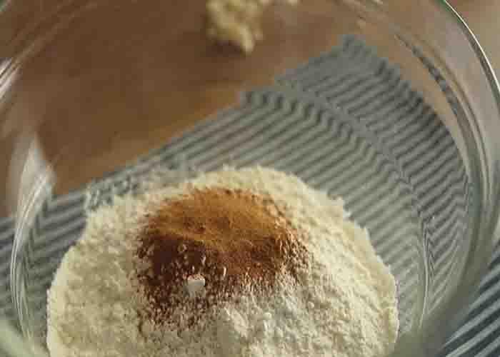 Combining the dry ingredients for the baked donut recipe