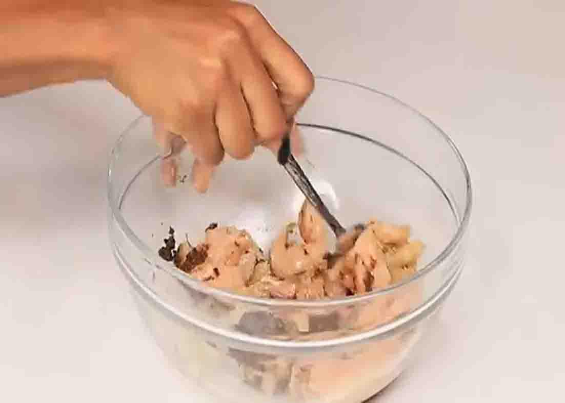 Marinating the chicken for the jerk chicken fried cabbage recipe