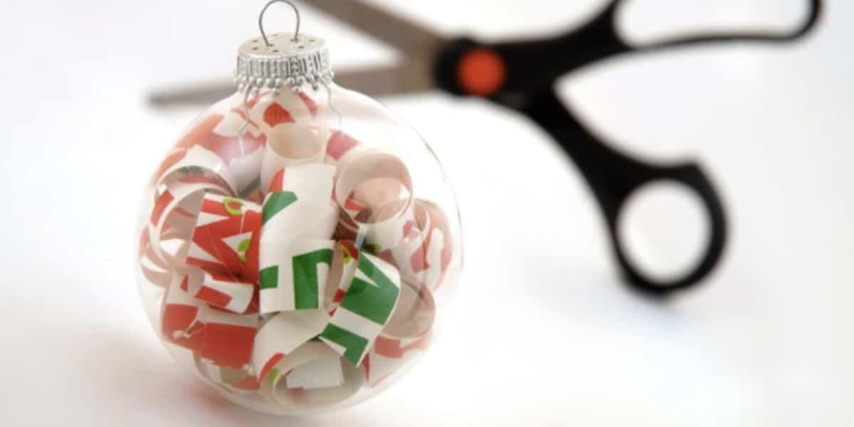 She Shows Us How To Make Easy Ornaments By Curling Wrapping Paper and Putting It Inside Clear Balls!