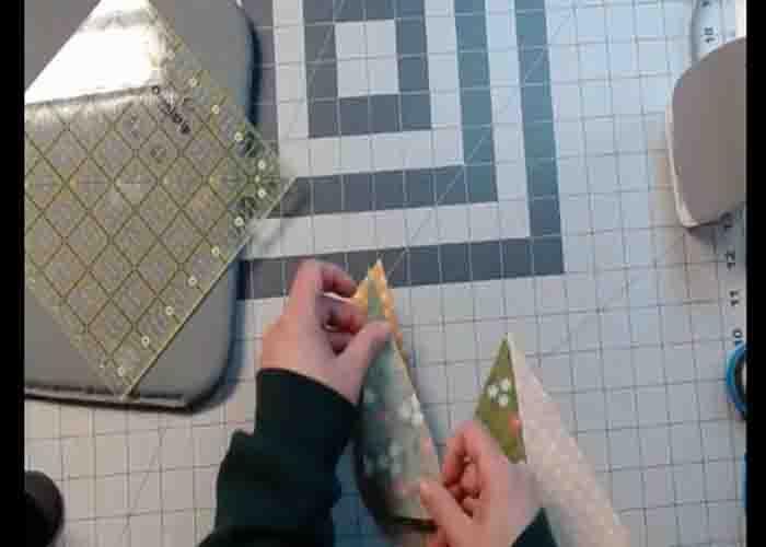 Cutting the fabric to make the quilted mug rug