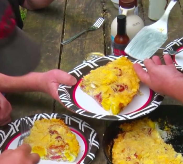 Make Bacon and Eggs Skillet Pie either on the pit or in the oven