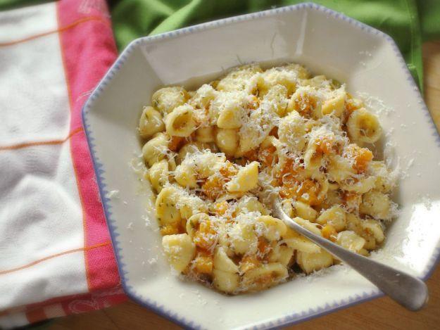 Pasta with butternut squash and sage brown butter, small pasta shapes with squash cubes and grated parmesan