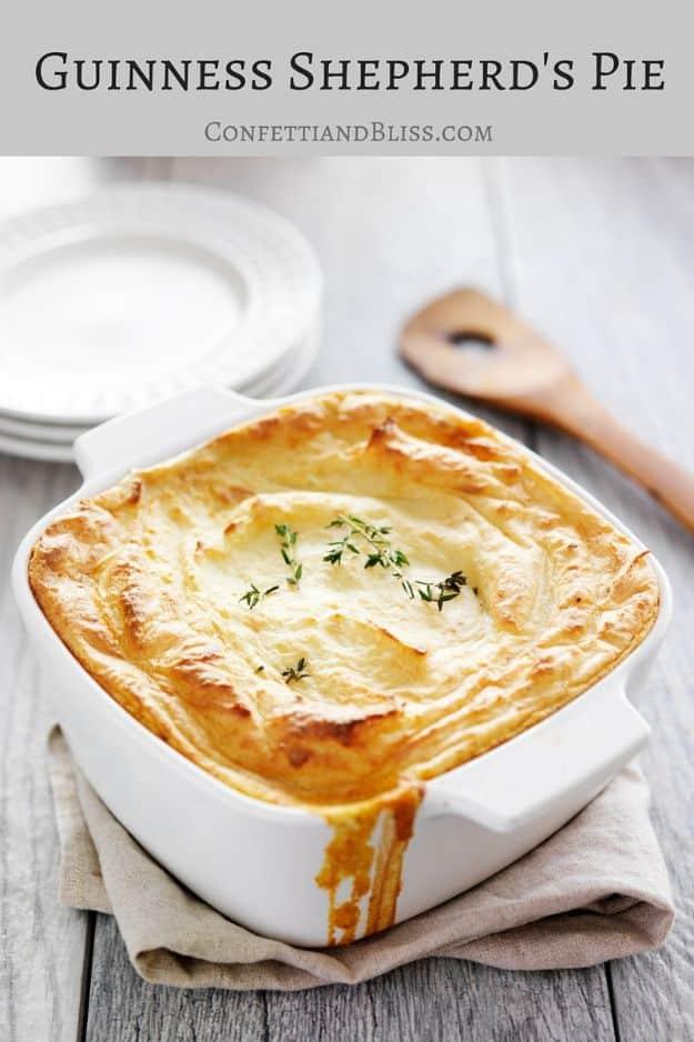 Guinness shepherd's pie graphic, a white baking dish of browned mashed potato topping with a title band