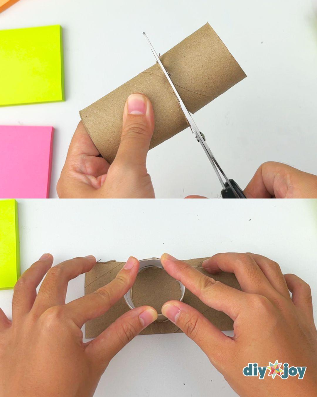 Two panel step of a cardboard tube being trimmed shorter with scissors to make a small paper flower vase
