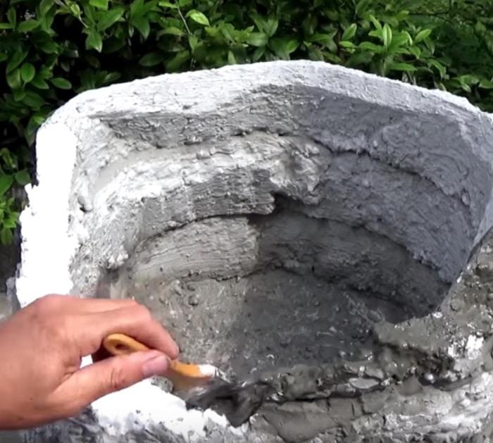 Make a cheap garden waterfall out of old styrofoam