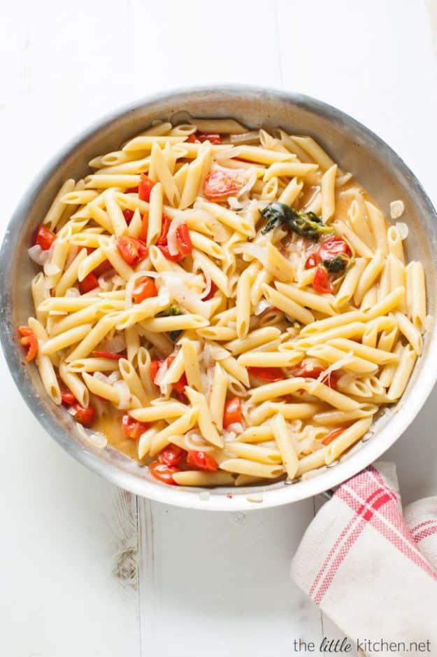 Easy dinner recipe: one pot penne pasta simmered with tomato and basil for minimal cleanup for the whole family